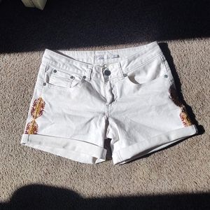 White Prana shorts with embroidered detail